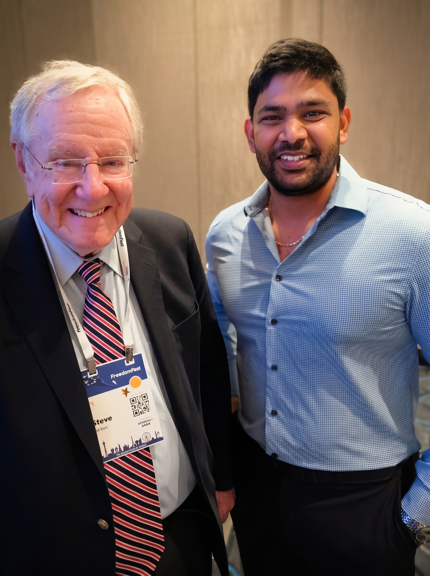 Portrait with Steve Forbes following a session on AI, capital, and industrial productivity