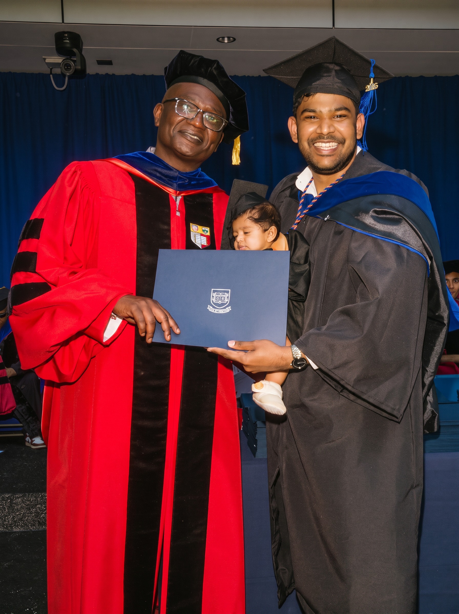 Vik Guttikonda — Yale MAM commencement with diploma, family, and faculty